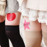 Japan's new medium: stick-on ads and short skirts